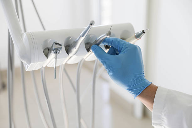 Professional Dental Implants technician working in Arnold Line, MS